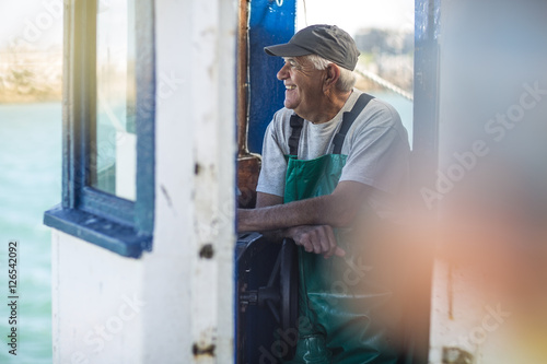 Fisherman working on trawler
