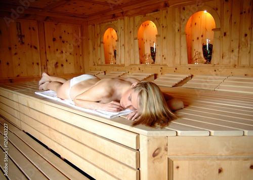 woman relaxing  in spa sauna