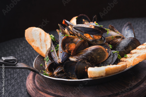 tasty mussels in pan