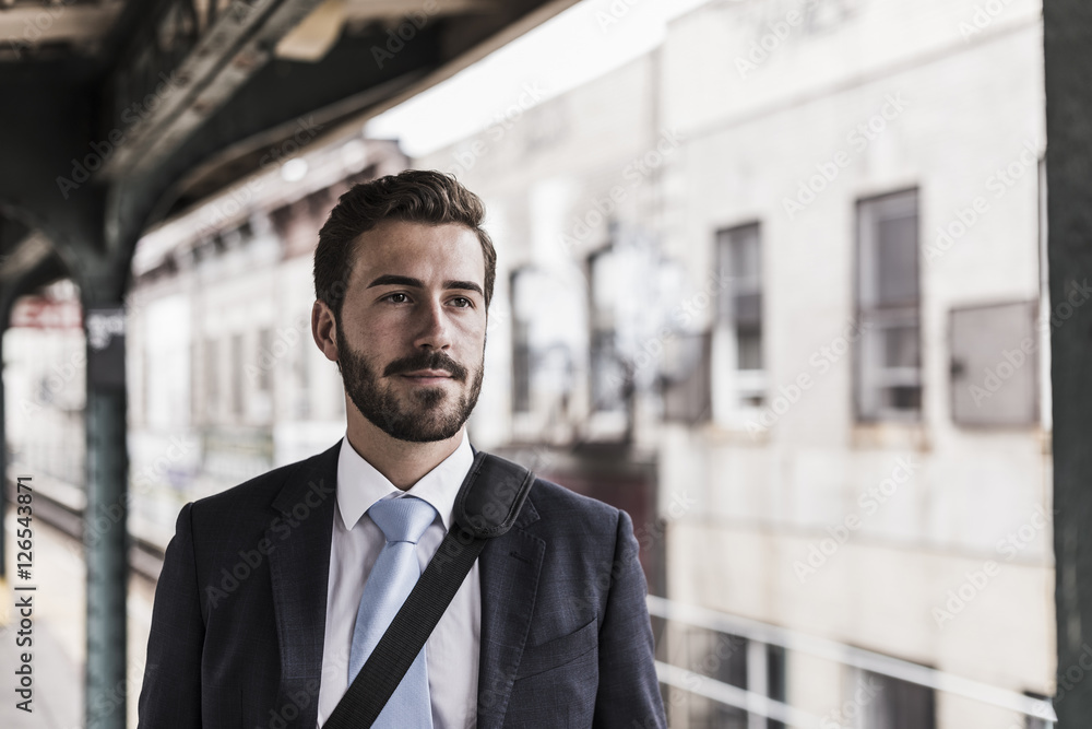 Businessman at station platform Businessman at station platform