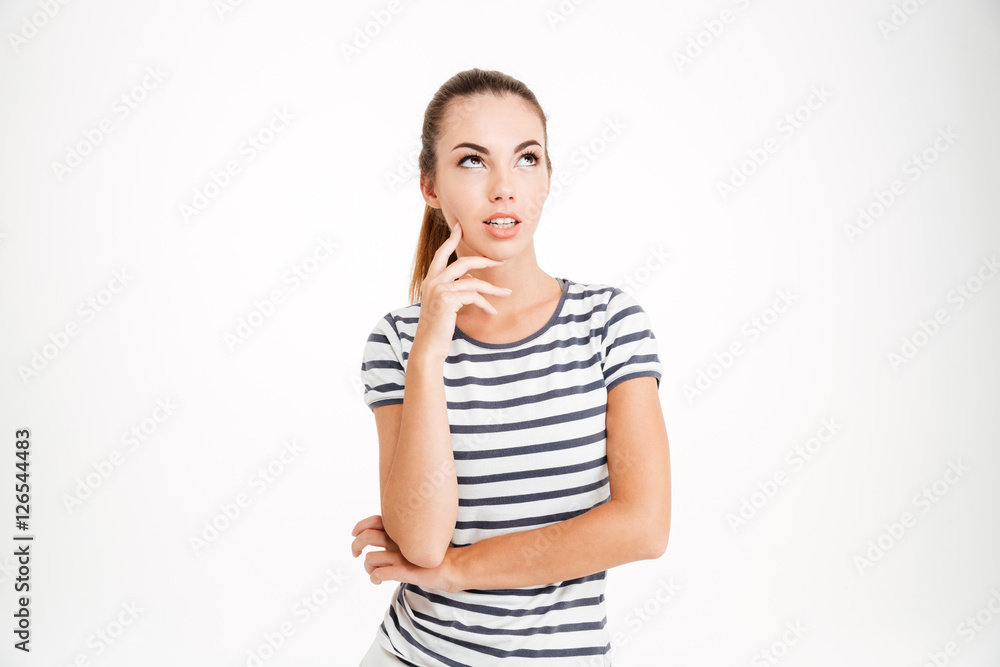 Portrait of a young pensive woman looking away at copyspace Portrait of a young pensive woman looking away at copyspace