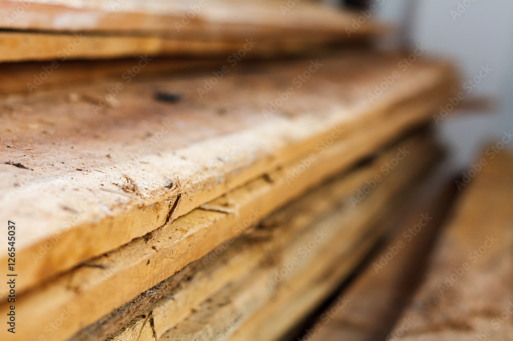 Large stack of wood planks Large stack of wood planks