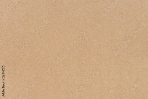 Old brown paper texture background. Seamless kraft paper texture background. Close-up paper texture using for background. Paper texture background with soft pattern. Highly detailed paper background. © tirachard