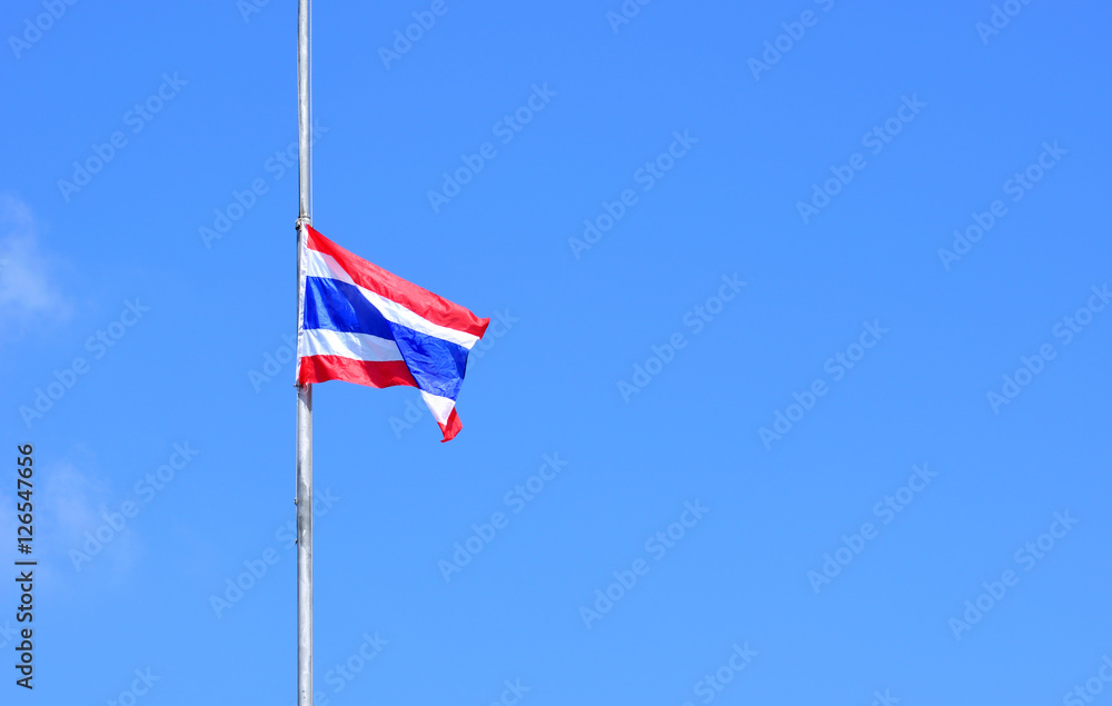 Half-mast of thailand flag or thailand flag on sky background.