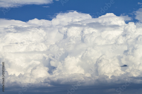 Fototapeta Naklejka Na Ścianę i Meble -  Cumulus white clouds in the blue sky
