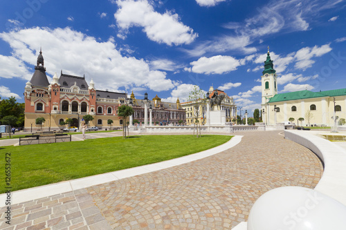 Union square (Piata Unirii) Oradea, Romania, cityscape with beautiful clouds photo