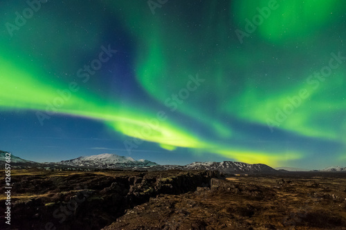 Aurora borealis over the Thingvellir National Park - Iceland