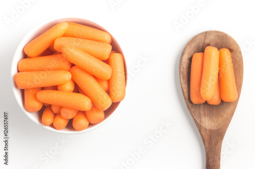 Mini Carrots Into a Bowl photo