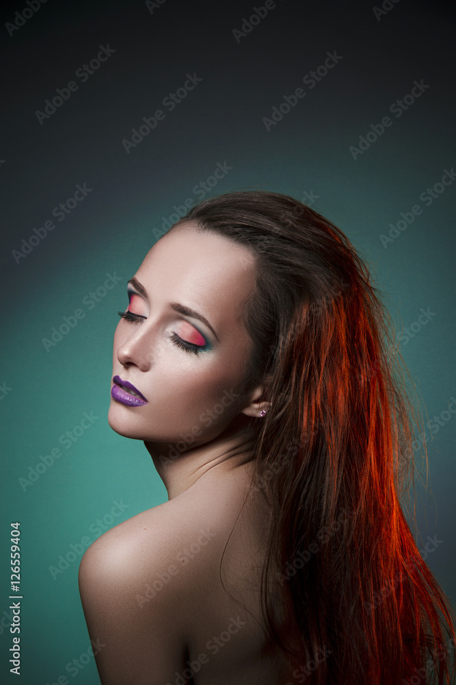 Fototapeta premium nice beautiful girl with blue eyes and lovely makeup on face