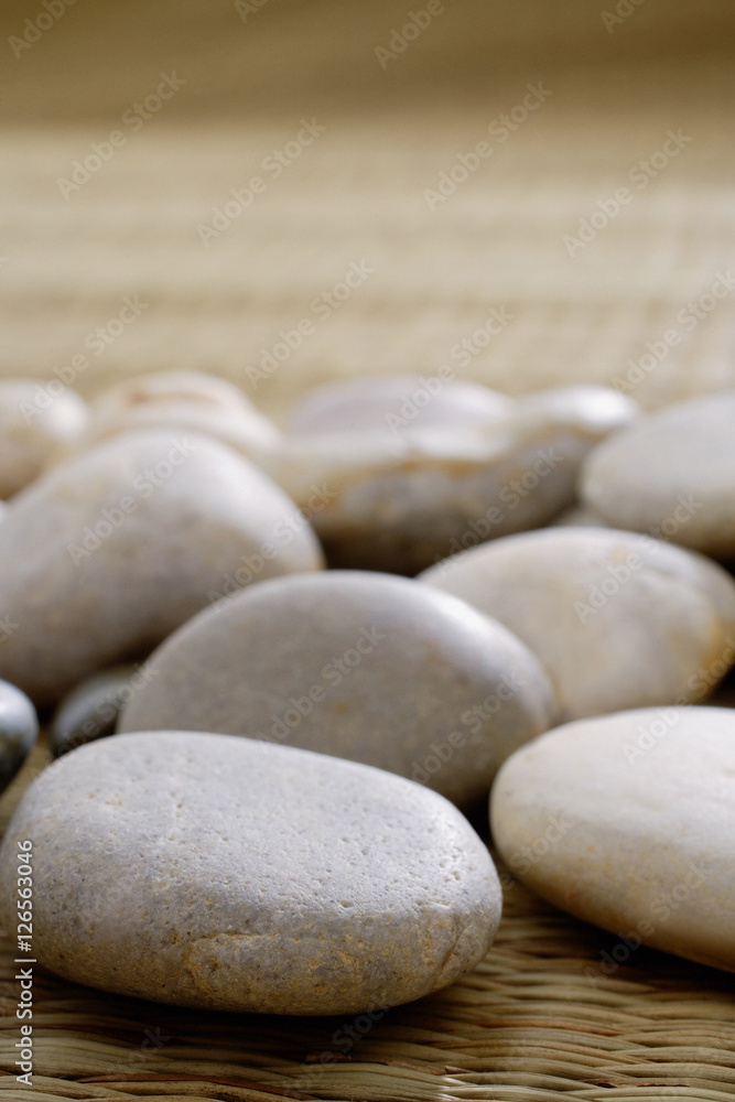 Close up of pebbles on a Tatami mat Close up of pebbles on a Tatami mat