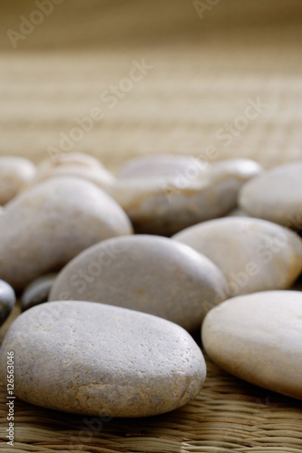 Close up of pebbles on a Tatami mat