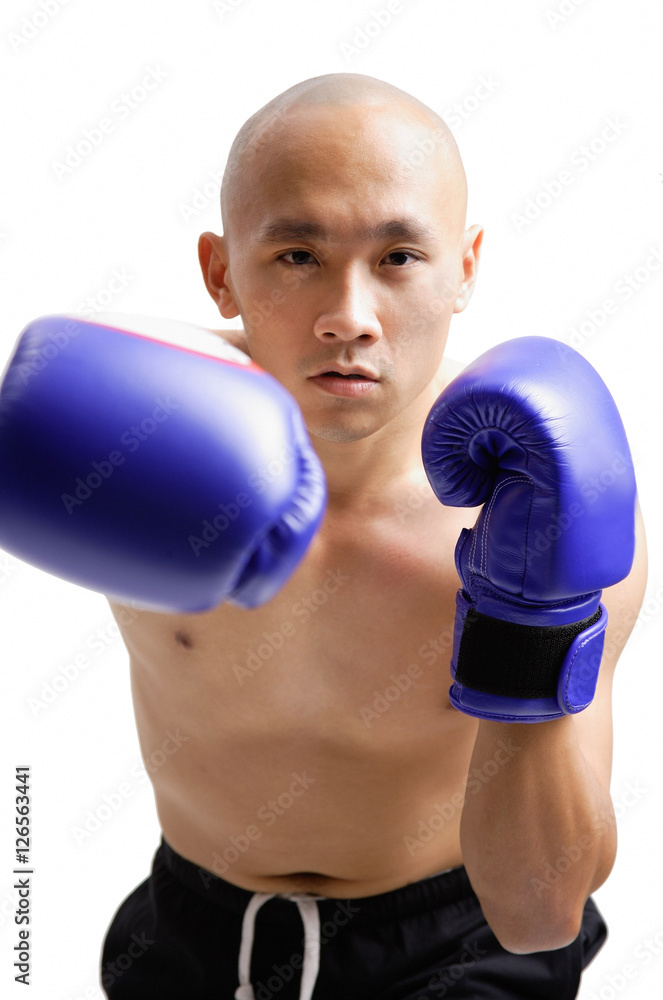 Young man wearing purple boxing gloves Young man wearing purple boxing gloves
