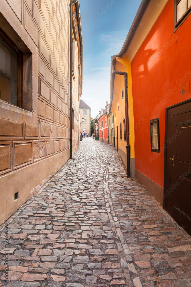 Golden street inside of Old Royal Palace in Prague, Czech Republic. Multicolored houses authentic retro. Golden street inside of Old Royal Palace in Prague, Czech Republic. Multicolored houses authentic retro.