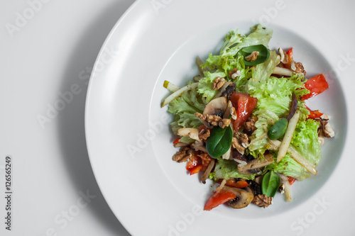 vegetarian salad with walnuts isloated;