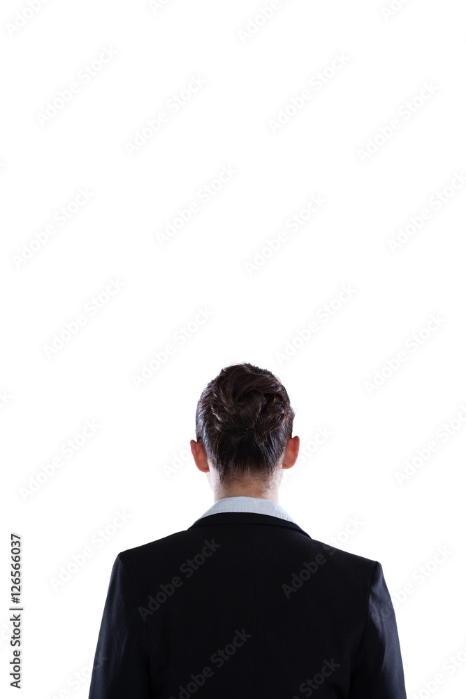 Businesswoman standing against white background