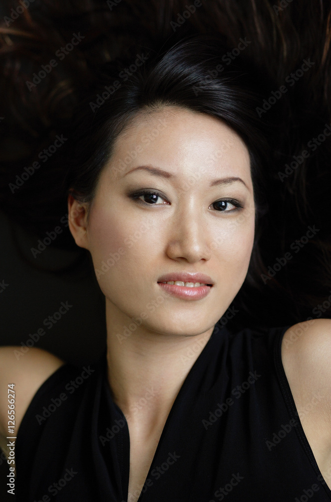 Fototapeta premium Woman looking at camera