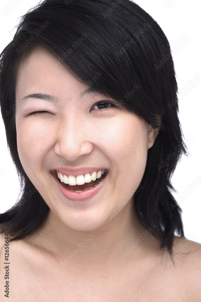 Young woman winking Young woman winking
