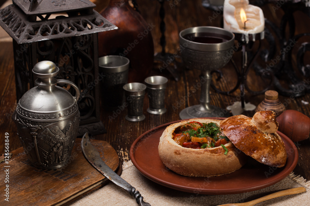 Baked vegetables laid out in a bread pot