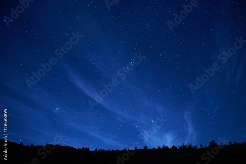 Tablou canvas Blue dark night sky with many stars