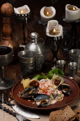 seafood salad with sauce and sun-dried tomatoes