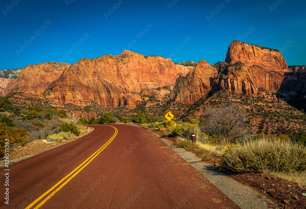 Riding on an open road winding through Southwest America Riding on an open road winding through Southwest America