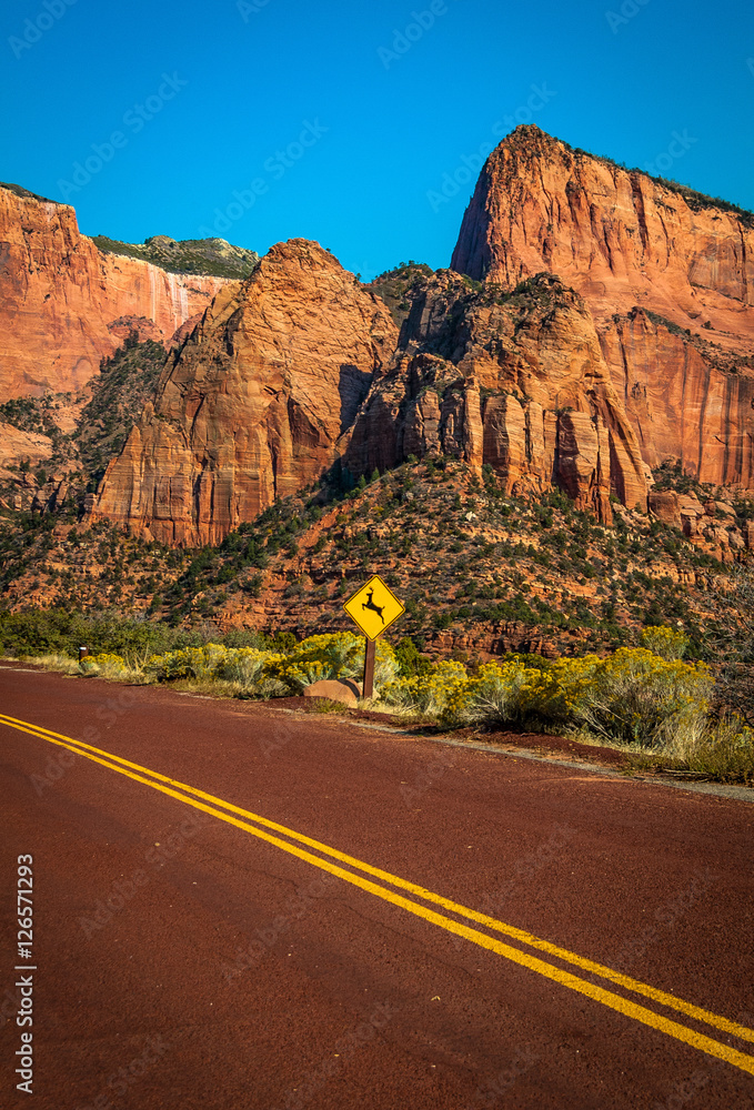 Riding on an open road winding through Southwest America Riding on an open road winding through Southwest America