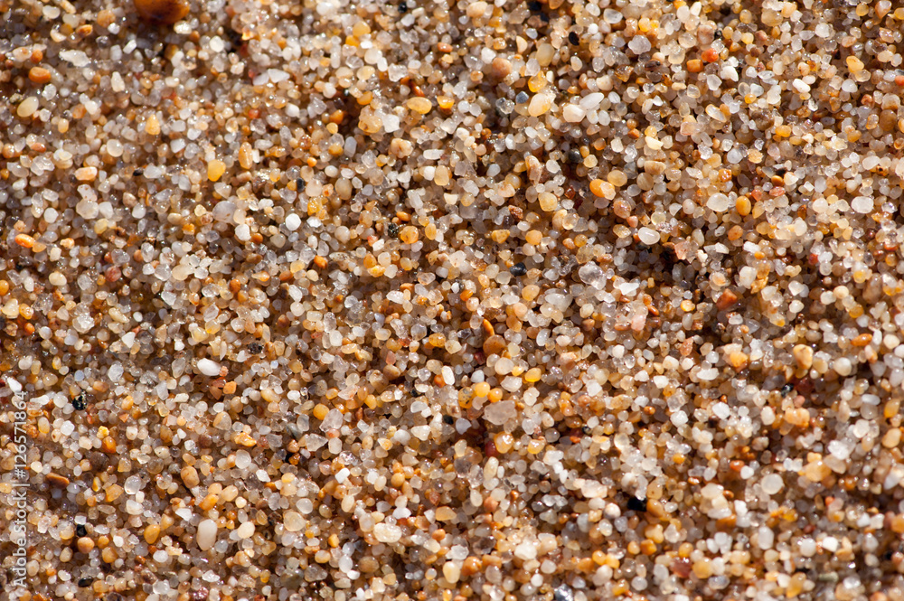 small sea stones and sand background texture small sea stones and sand background texture
