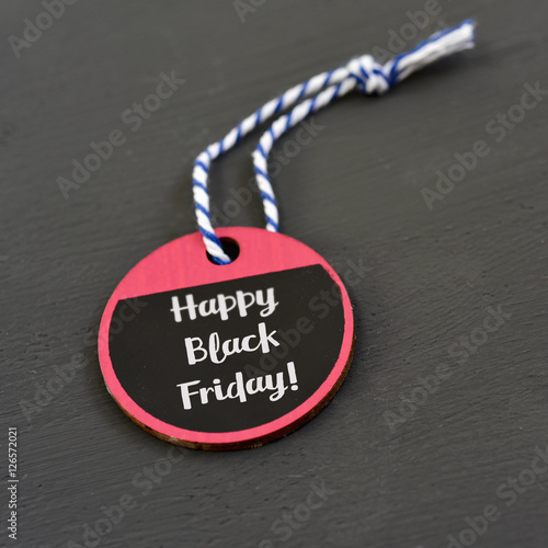text happy black friday in a paper label