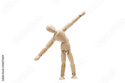Wooden man practices yoga and fitness
