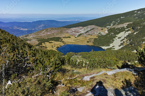 Landscape with green hills and Yonchevo lake, Rila Mountain, Bulgaria