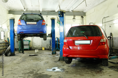 Car under repair in a car repair station