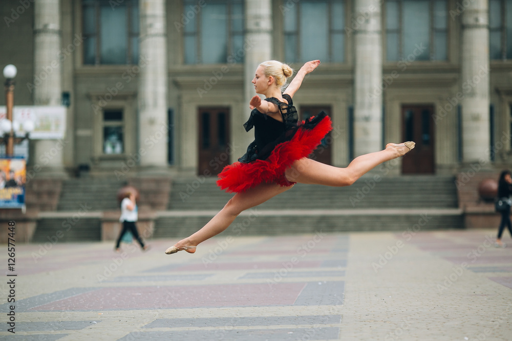 Ballerina doing splits in the air Stock Photo | Adobe Stock