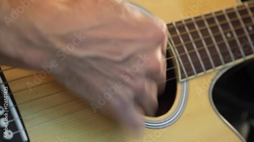 Musician playing - practicing guitar, close up; 