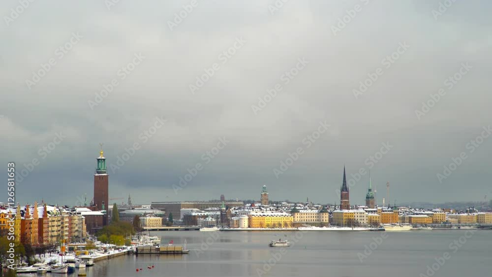 Stockholm covered in snow with a public ferry crossing the bay. Stockholm covered in snow with a public ferry crossing the bay.