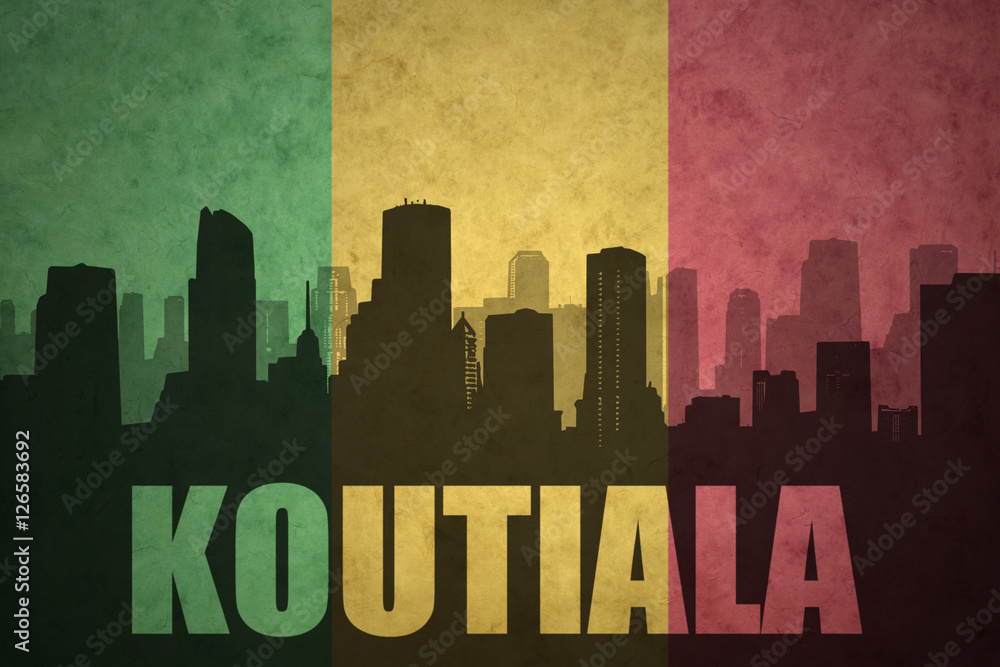 abstract silhouette of the city with text Koutiala at the vintage malian flag