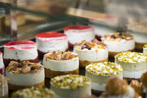 showcase with homemade cakes in a shop