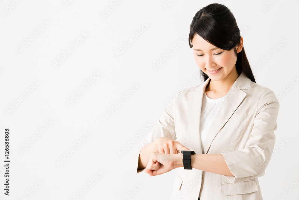 portrait of asian businesswoman using smart watch isolated on white background portrait of asian businesswoman using smart watch isolated on white background