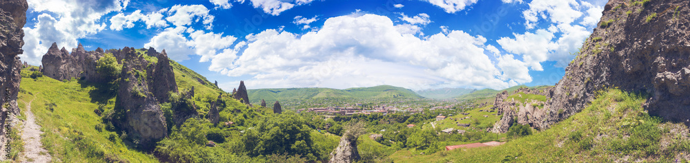 View on mountain cliffs and magnificent cloudy sky on background. Exploring Armenia