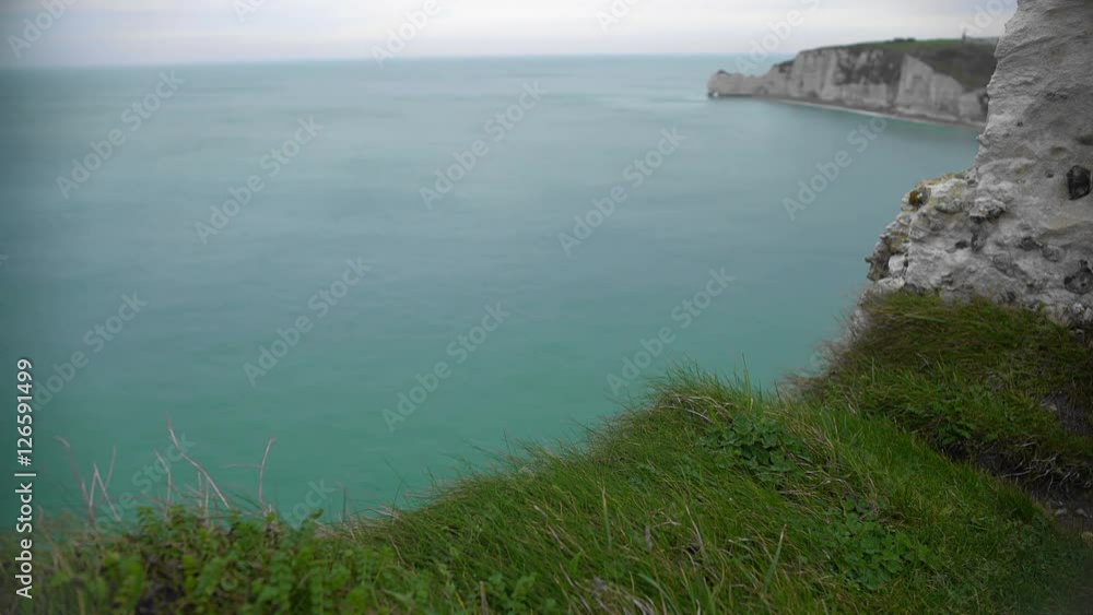 View on English Channel and rocky cliffs in Etretat, France, divine nature View on English Channel and rocky cliffs in Etretat, France, divine nature