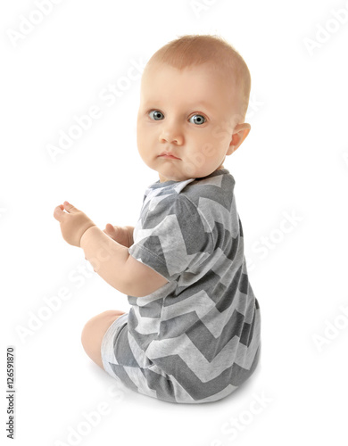 Adorable little baby on whi...