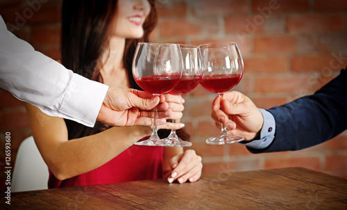 People toasting with glasse...