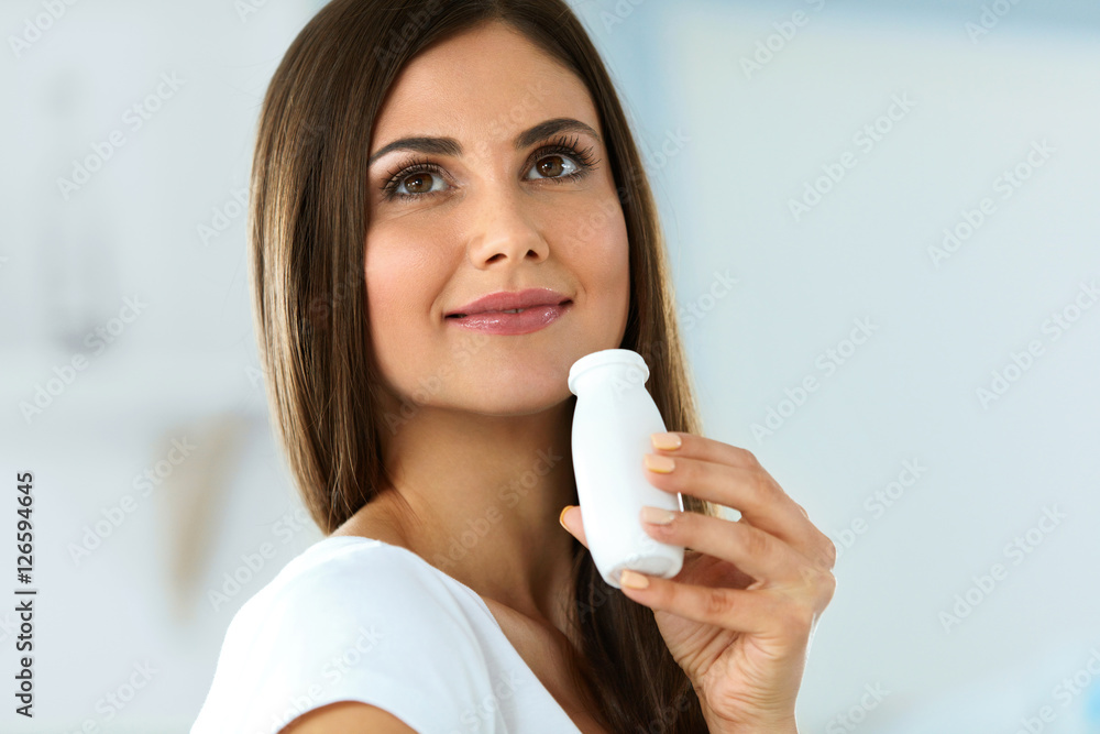 Healthy Diet. Beautiful Smiling Woman Drinking Natural Yoghurt Healthy Diet. Beautiful Smiling Woman Drinking Natural Yoghurt