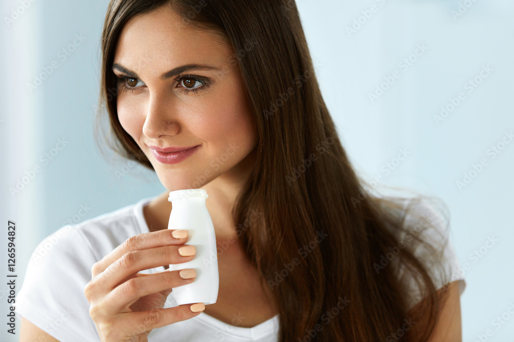 Healthy Diet. Beautiful Smiling Woman Drinking Natural Yoghurt Healthy Diet. Beautiful Smiling Woman Drinking Natural Yoghurt