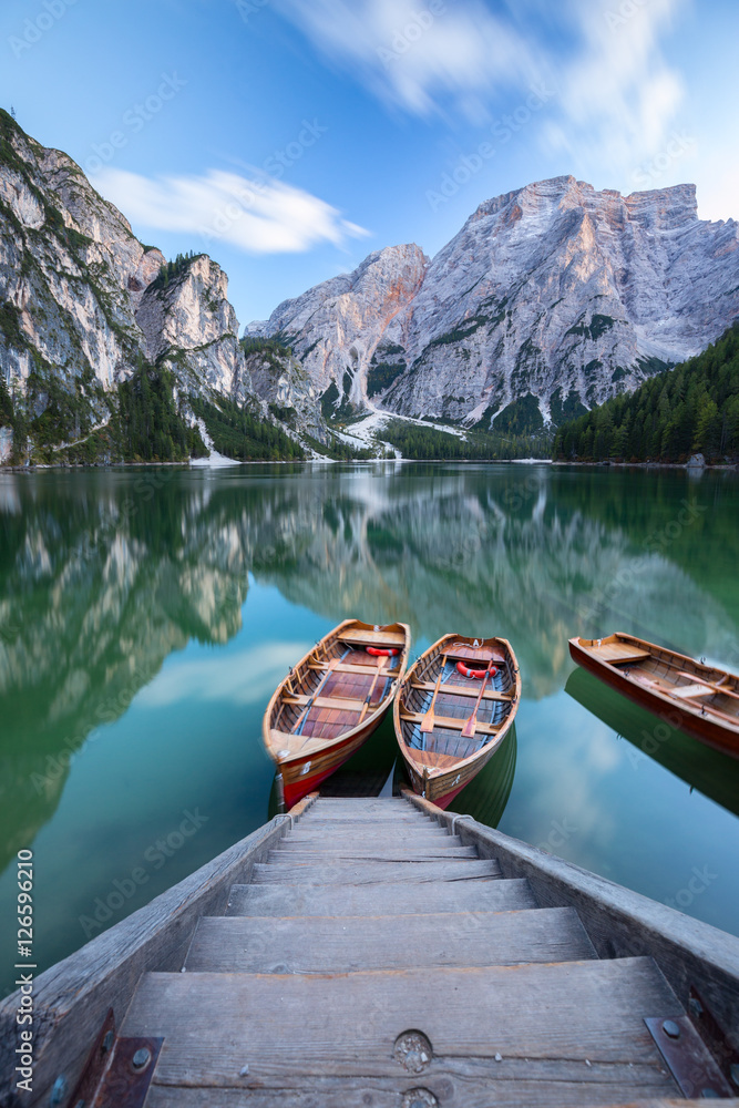 Fototapeta premium Boats on the Braies Lake ( Pragser Wildsee ) in Dolomites mounta