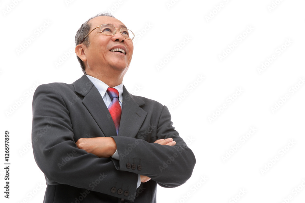 Businessman looking away, arms crossed Businessman looking away, arms crossed