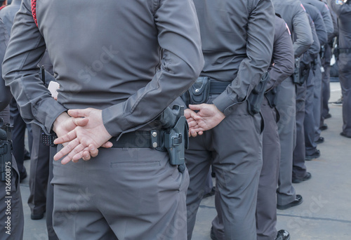 Police and gun , working to prevent crime.