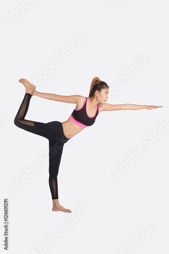 Fototapeta Naklejka Na Ścianę i Meble -  Young woman in yoga pose.