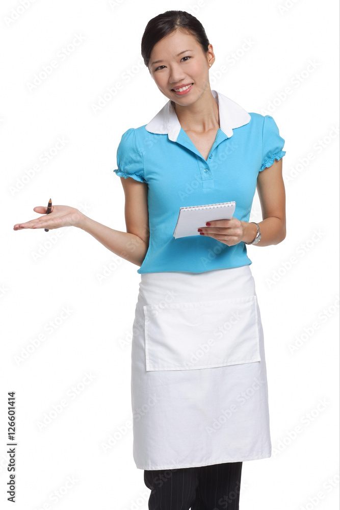 Waitress smiling at camera, holding notepad