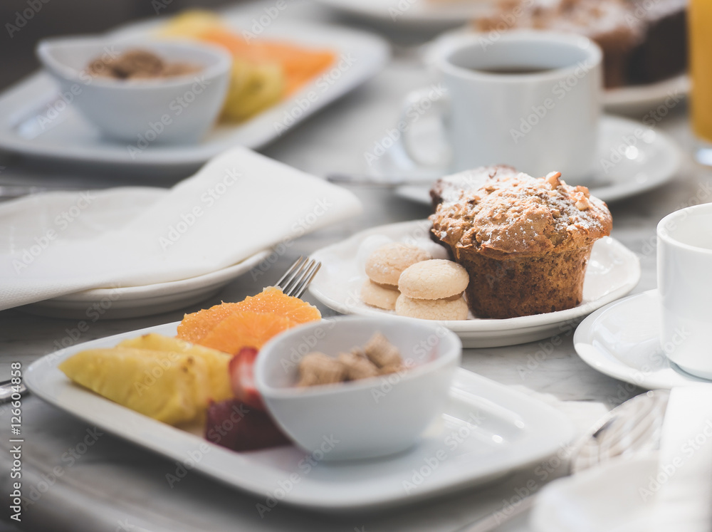 Delicious breakfast with fruits and sweets Delicious breakfast with fruits and sweets