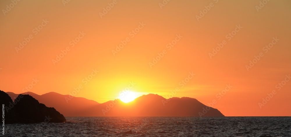 Sunset over Islands in the Whitsundays QLD Australian Sunset over Islands in the Whitsundays QLD Australian